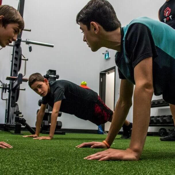 Our Programs - Youth and Teen Functional Training (Front Plank - Group)